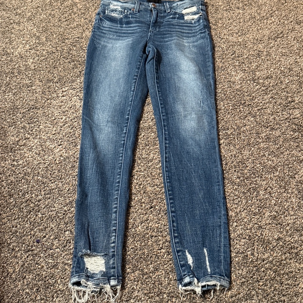Buckle Black High Rise Distressed Denim Jeans